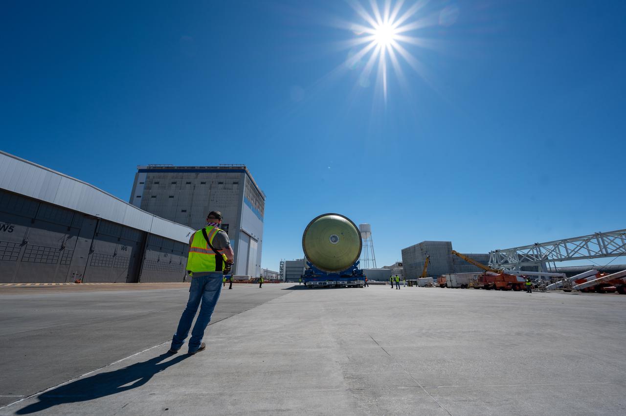 This image highlights the liquid hydrogen tank that will be used on the core stage of NASA’s Space Launch System rocket for Artemis II, the first crewed mission of NASA’s Artemis program. The tank is being built at NASA’s Michoud Assembly Facility in New Orleans. The SLS core stage is made up of five unique elements: the forward skirt, liquid oxygen tank, intertank, liquid hydrogen tank, and the engine section. The liquid hydrogen tank holds 537,000 gallons of liquid hydrogen cooled to minus 423 degrees Fahrenheit and sits between the core stage’s intertank and engine section. The liquid hydrogen hardware, along with the liquid oxygen tank, will provide propellant to the four RS-25 engines at the bottom of the cores stage to produce more than two million pounds of thrust to launch NASA’s Artemis missions to the Moon. Together with its four RS-25 engines, the rocket’s massive 212-foot-tall core stage — the largest stage NASA has ever built — and its twin solid rocket boosters will produce 8.8 million pounds of thrust to send NASA’s Orion spacecraft, astronauts and supplies beyond Earth’s orbit to the Moon and, ultimately, Mars. Offering more payload mass, volume capability and energy to speed missions through space, the SLS rocket, along with NASA’s Gateway in lunar orbit, the human landing system, and Orion spacecraft, is part of NASA’s backbone for deep space exploration and the Artemis lunar program. No other rocket can send astronauts in Orion around the Moon in a single mission.